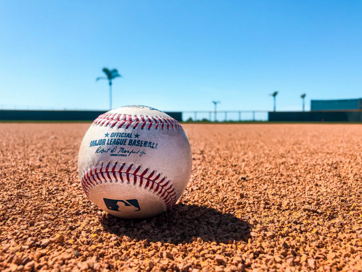 Baseball Sitting on Dirt